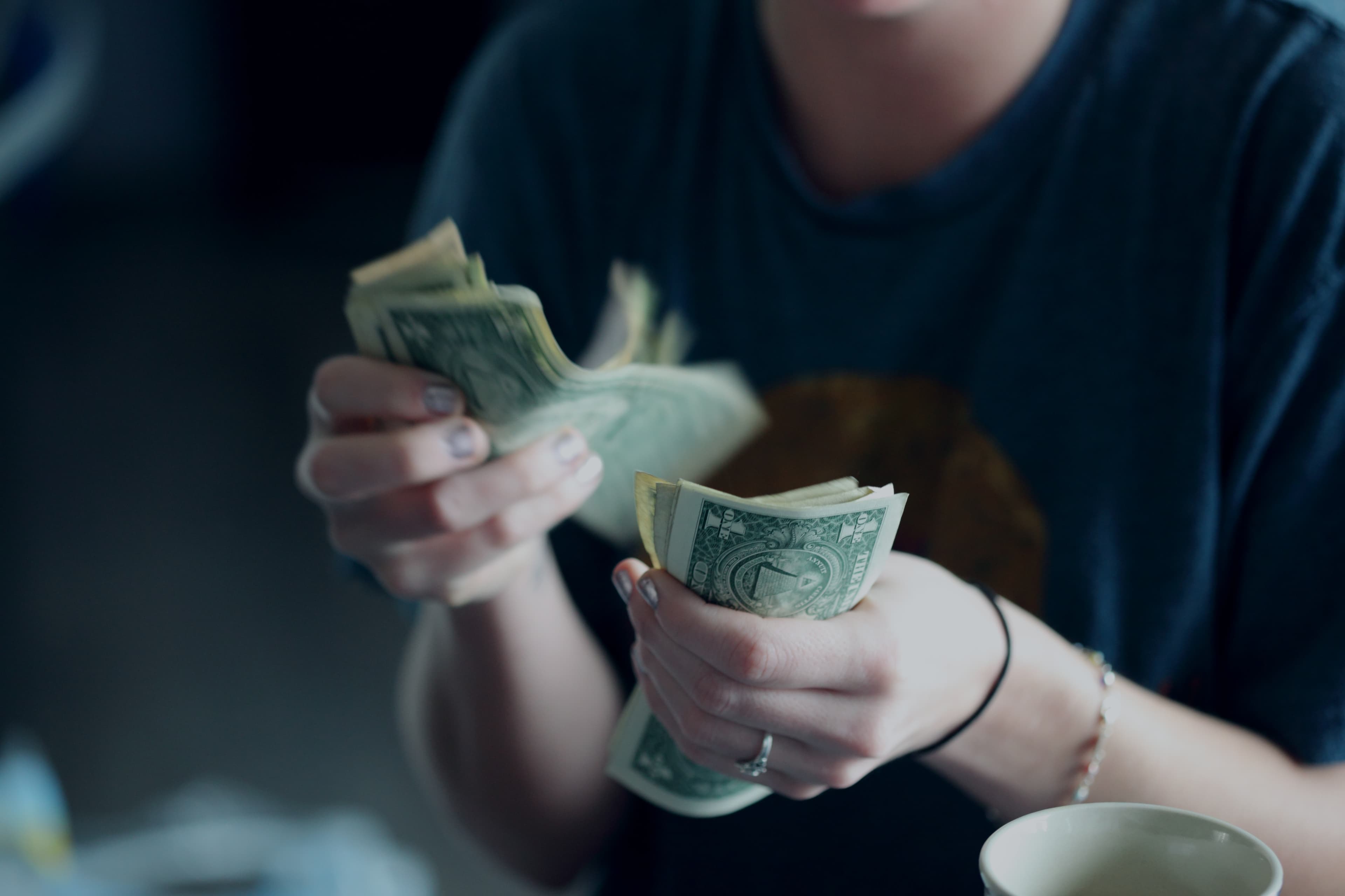 hands counting cash