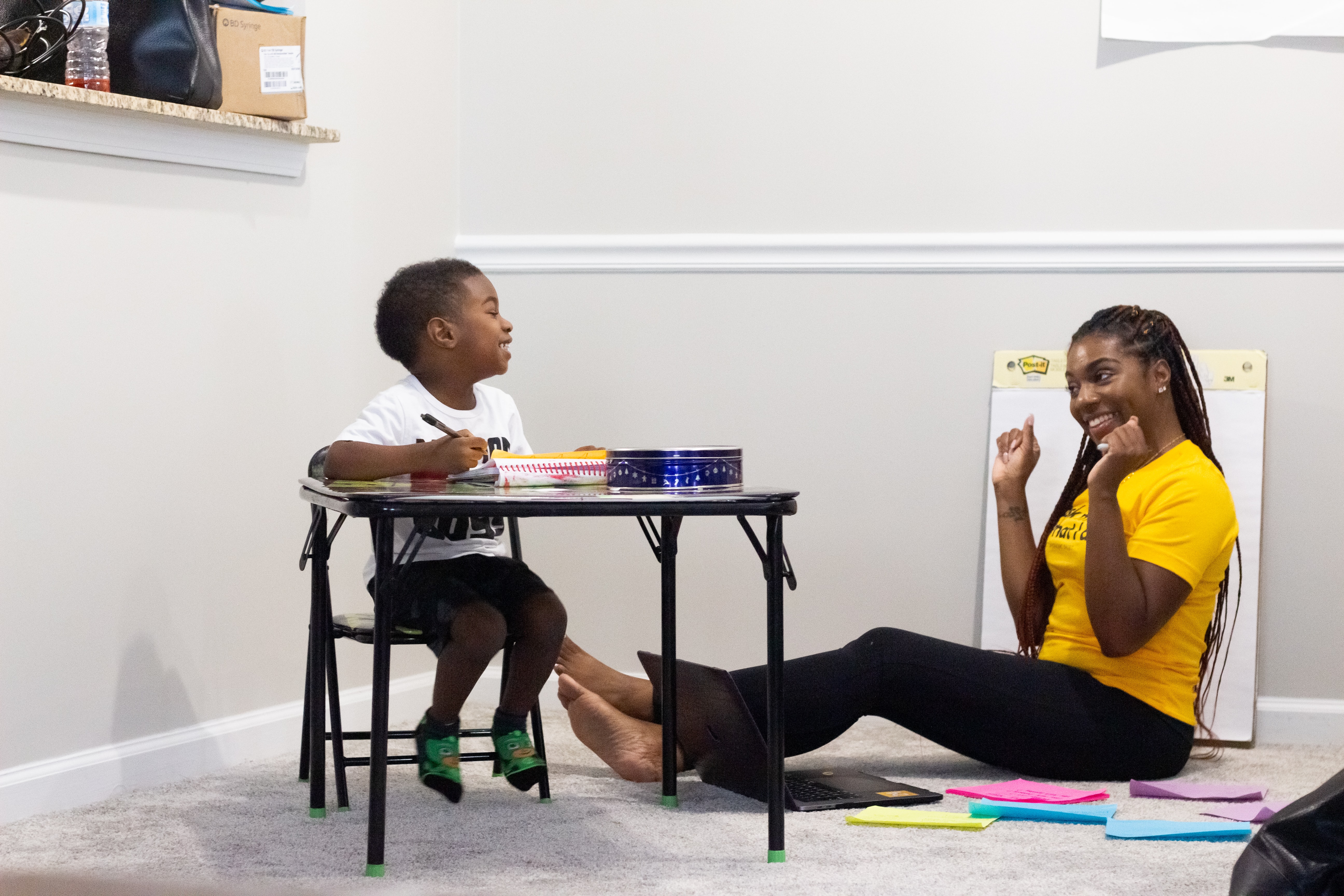 An adult and a child learning together