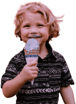 Image of smiling boy eating ice cream