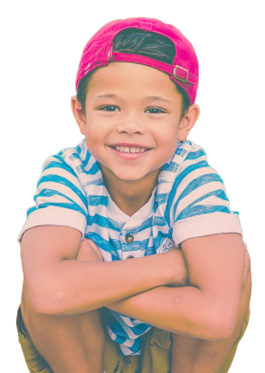 An image of a smiling child looking at the camera